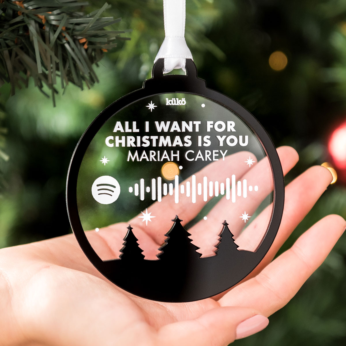 kuko-adorno-spotify-relieve-negro-1200px